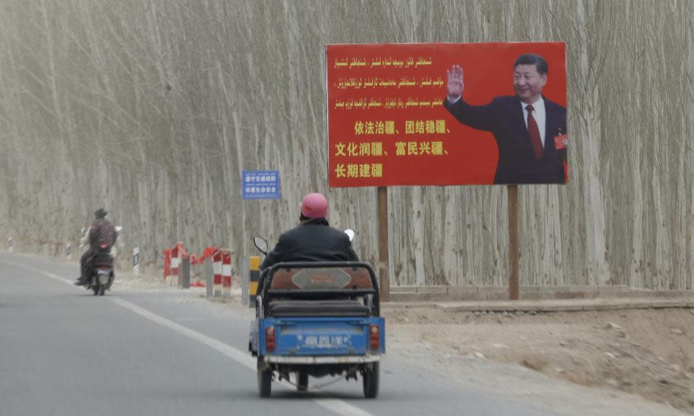 <span>Photograph: Ng Han Guan/AP</span>