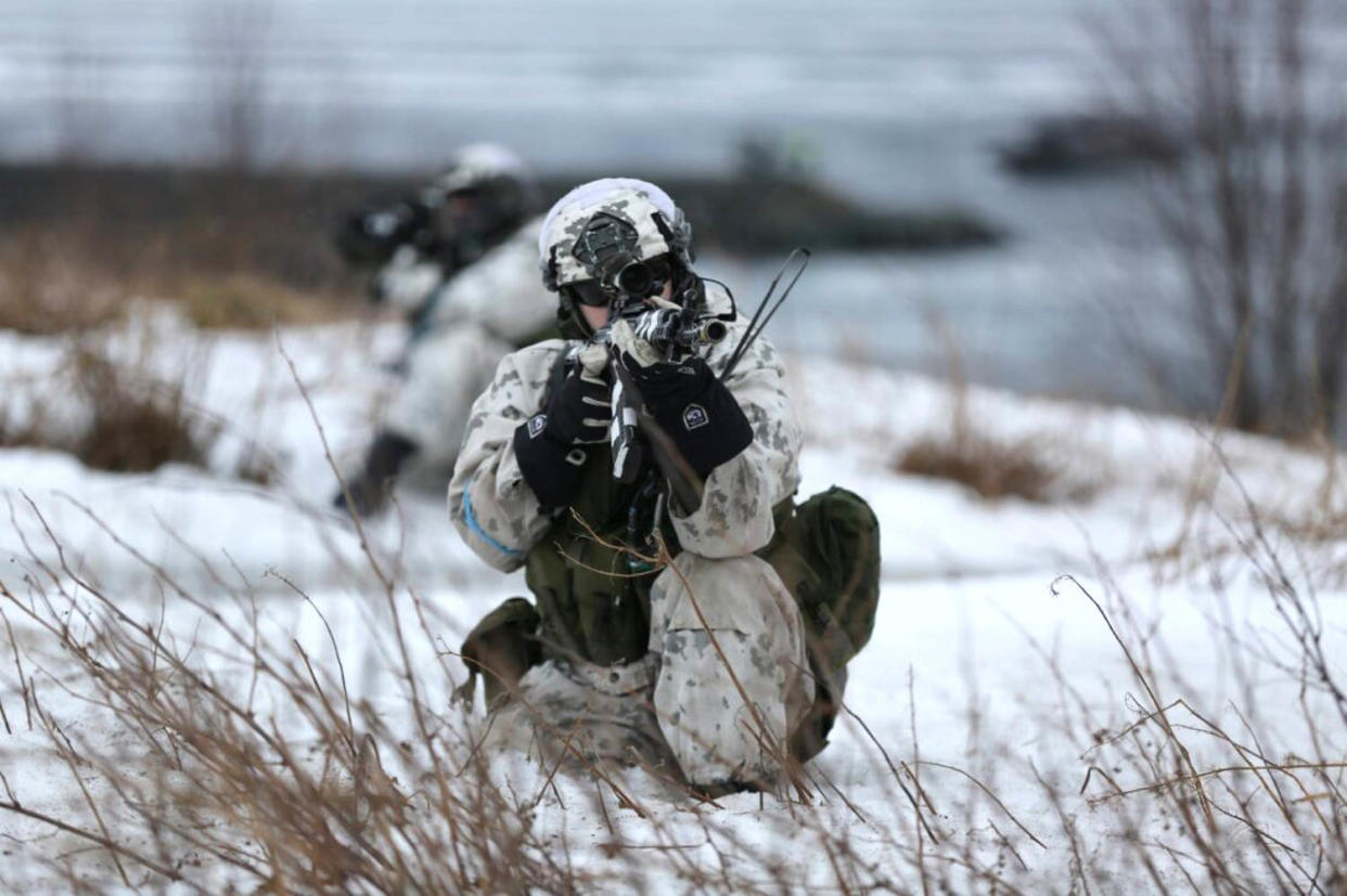 A Swedish soldier takes part in an amphibious assault during a NATO exercise in Badderen, Norway. (Carlo Angerer / NBC News)