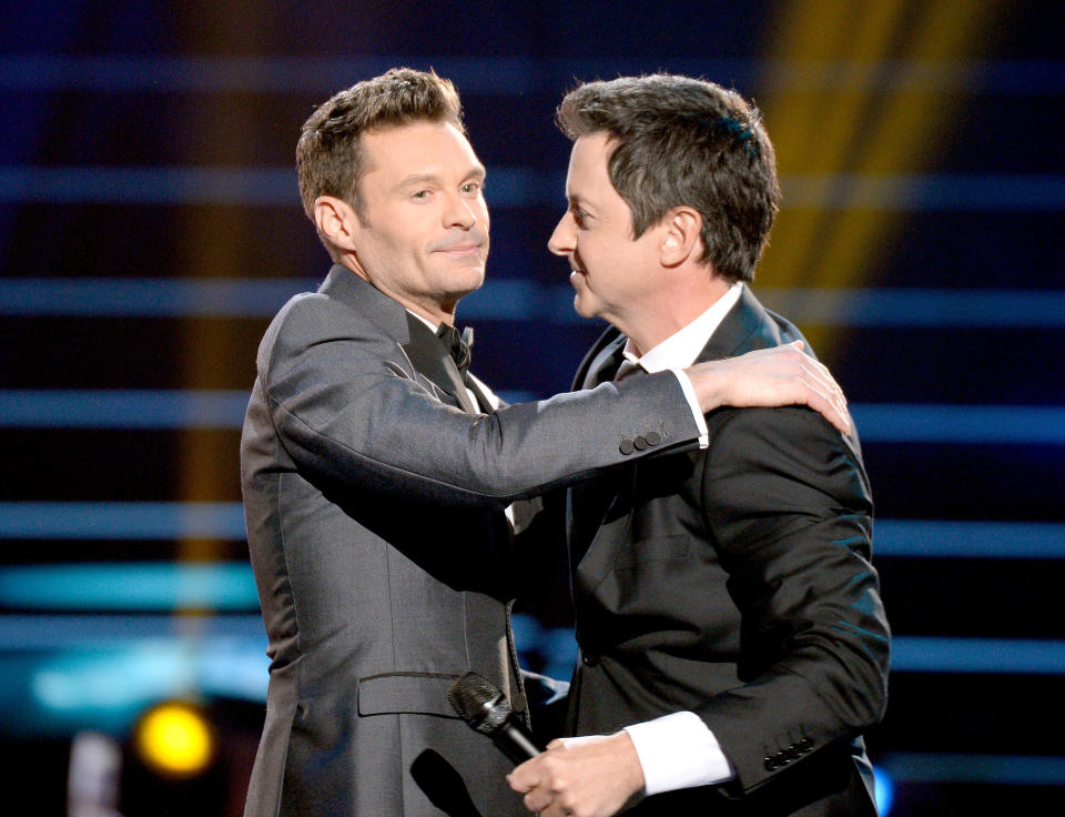 Ryan Seacrest and Brian Dunkleman onstage during Fox's "American Idol" finale on April 7, 2016. (Photo: Kevork Djansezian via Getty Images)