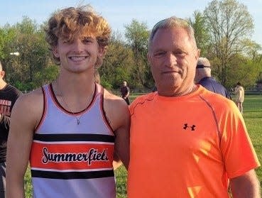 Summerfield's Brandon Thompson (left) ran 1:57.3 in the 800 meters Tuesday to break a school record set by his coach Jamie LaRocca (right) in 1976.