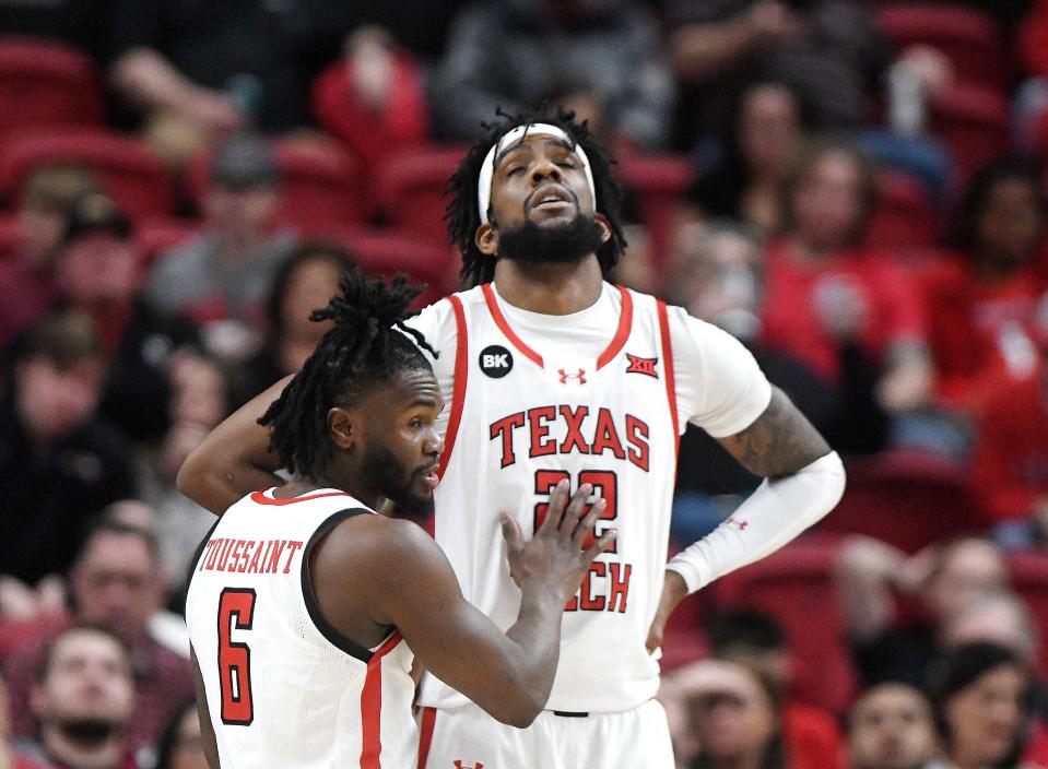 Texas Tech's guard Joe Toussaint (6) consoles Texas Tech's forward Warren Washington (22) after Washington's missed dunk against Oral Roberts in a non-conference basketball game, Tuesday, Dec. 12, 2023, at United Supermarkets Arena.