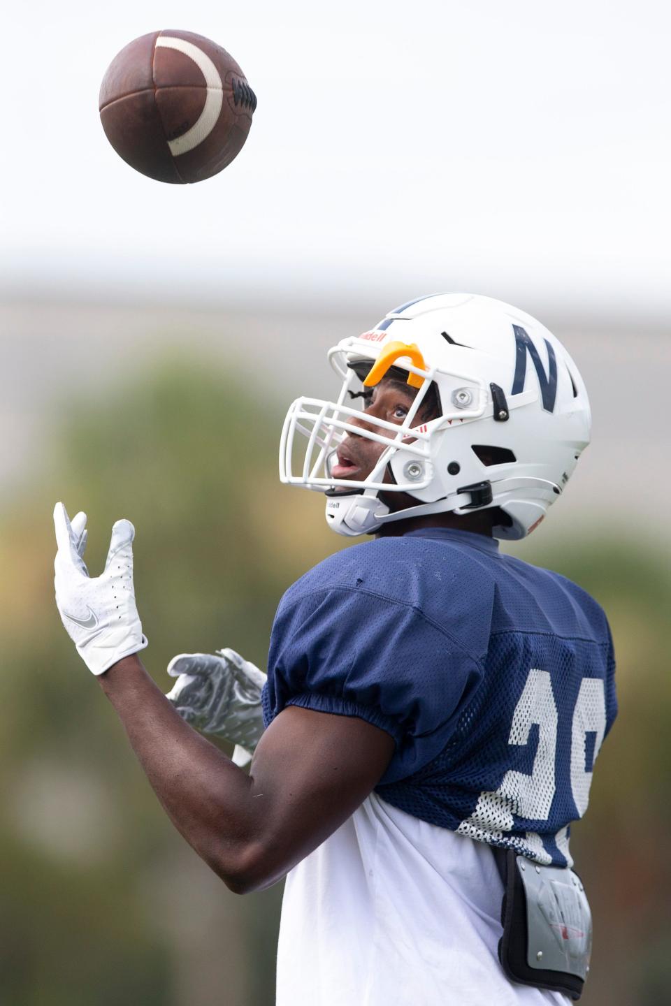 Naples’ Kerry Brown catches a pass during football practice, Tuesday, Aug. 9, 2022, at Naples High School in Naples, Fla.