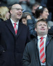 Manchester United owner Avram Glazer (L) watches his team play against Manchester City at The Etihad stadium in Manchester, north-west England on April 30, 2012. AFP PHOTO/PAUL ELLIS RESTRICTED TO EDITORIAL USE. No use with unauthorized audio, video, data, fixture lists, club/league logos or “live” services. Online in-match use limited to 45 images, no video emulation. No use in betting, games or single club/league/player publications.PAUL ELLIS/AFP/GettyImages