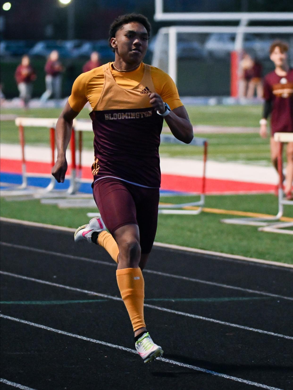 Bloomington North’s Jaidyn Johnson wins the boys' 200 meter dash during the track meet at Owen Valley on Thursday, March 28, 2024.