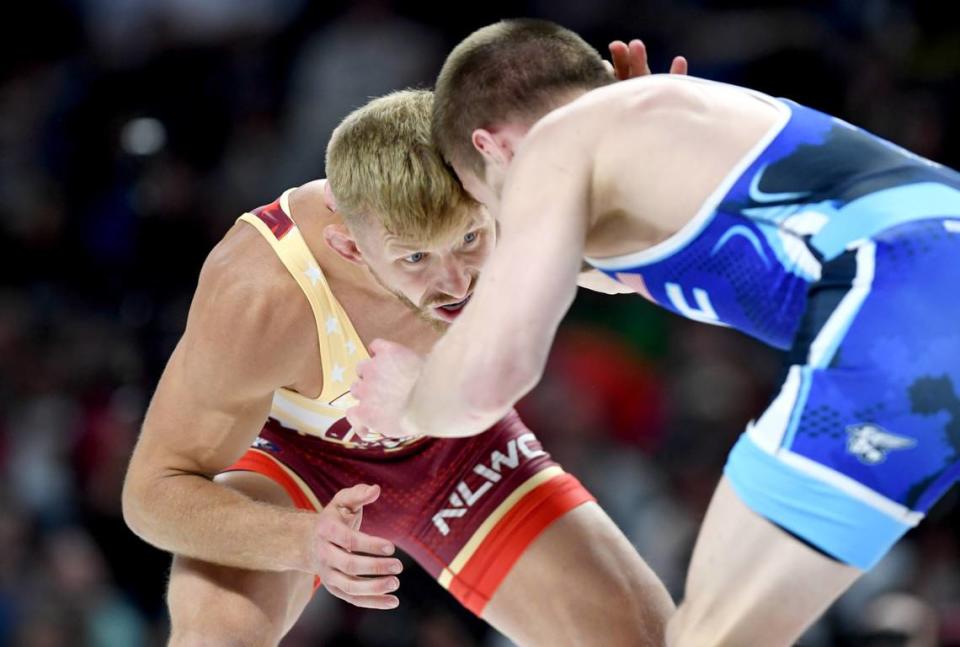 Kyle Dake wrestles Jason Nolf in the first of their best-of-three series final in 74 kg during the U.S. Olympic Team Trials at the Bryce Jordan Center on Saturday, April 20, 2024. Dake won by decision, 4-1.