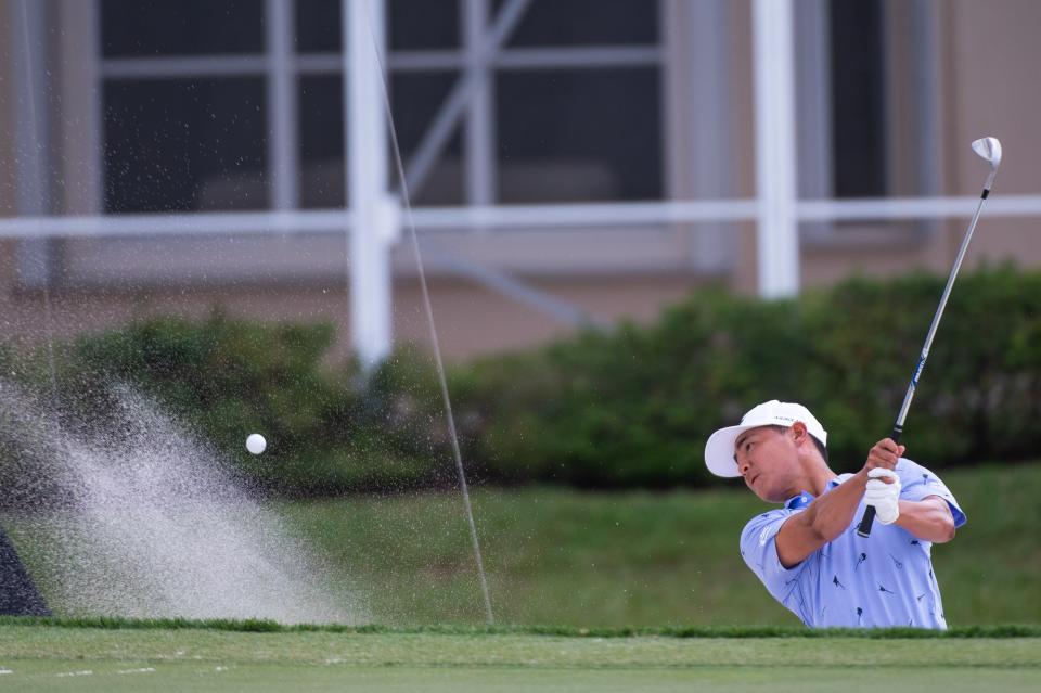 Justin Suh hits out of the sand trap on the 16th hole during the second round of the Honda Classic at PGA National Resort & Spa on Friday, February 24, 2023, in Palm Beach Gardens, FL.