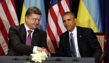 U.S. President Barack Obama meets with Ukraine President-elect Petro Poroshenko in Warsaw June 4, 2014. REUTERS/Kevin Lamarque