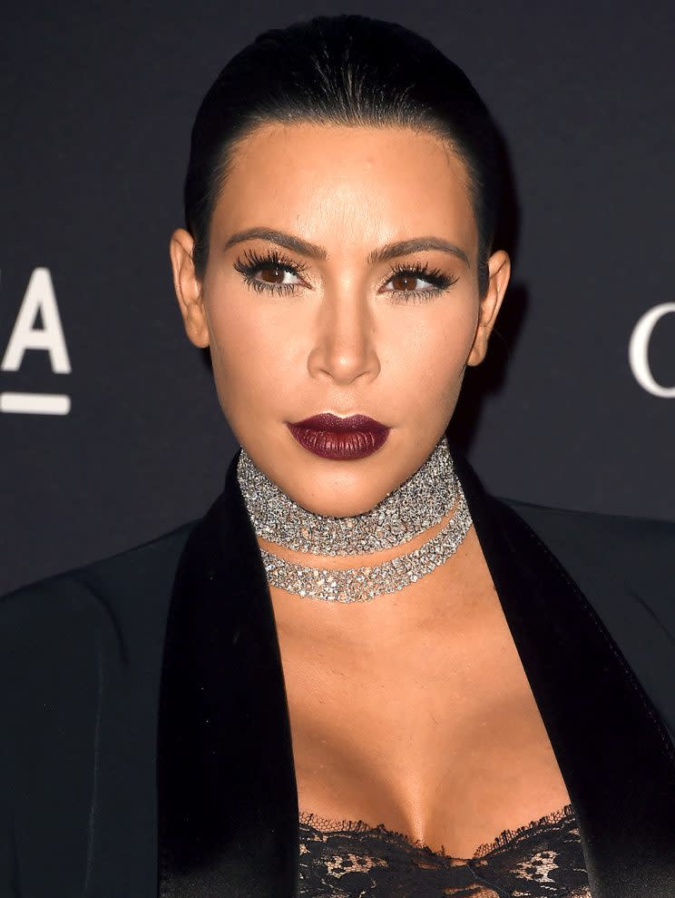 Those Kardashians are such drama queens! Kim certainly was when she opted for a dark plum lipstick at a November 2015 gala. (Photo: Steve Granitz/WireImage)