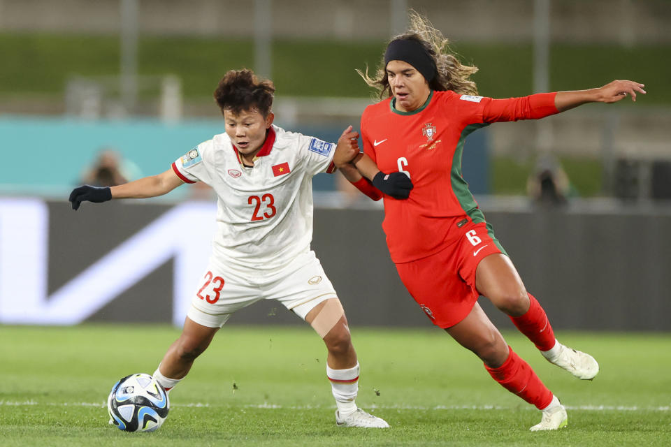 Vietnam's Thi Bich Thuy Nguyen, left, and Portugal's Andreia Jacinto duel for the ball during the Women's World Cup Group E soccer match between Portugal and Vietnam in Hamilton, New Zealand, Thursday, July 27, 2023. The group stage was the source of enormous national pride for Portugal, the Philippines, Vietnam, Panama, Ireland, Haiti, Zambia and Morocco, all newcomers to the highest level of international women's soccer. (AP Photo/Juan Mendez)