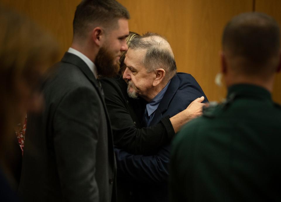 David Murdock hugs defense attorney Debra Tuomey after the jury's recommendation on Wednesday.