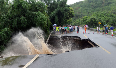 A road is seen damaged by heavy rainfall as Typhoon Nepartak lands in Fuzhou, Fujian Province, China, July 9, 2016. Picture taken July 9, 2016. REUTERS/Stringer ATTENTION EDITORS - THIS IMAGE WAS PROVIDED BY A THIRD PARTY. EDITORIAL USE ONLY. CHINA OUT