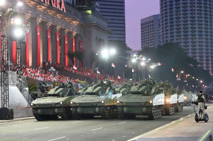 A procession of military vehicles at National Day Parade 2015. Photo: AFP