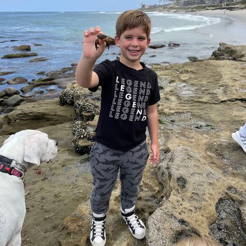 <p>Christina Hall Instagram</p> Christina Hall's son Brayden El Moussa on the beach
