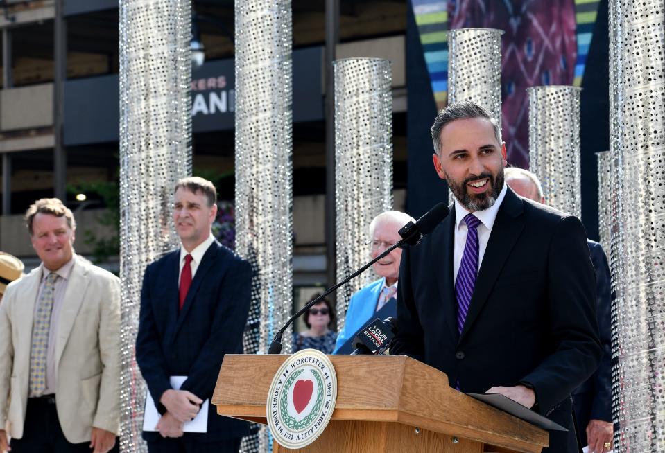 City Manager Eric Batista speaks during the rededication of the Francis R. Carroll Plaza Wednesday evening.