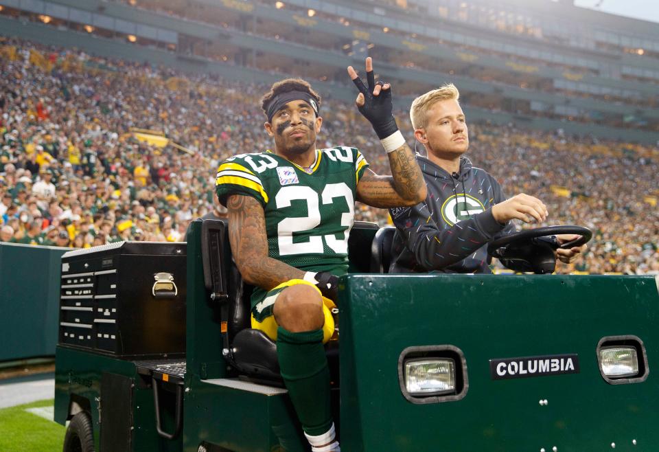 Green Bay Packers cornerback Jaire Alexander (23) is driven from the field after being injured during the third quarter against the Pittsburgh Steelers at Lambeau Field.