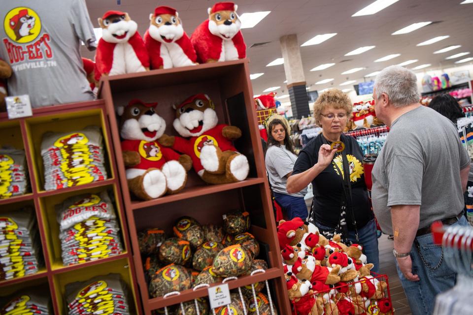 Customers browse Buc-ee's themed merchandise during the grand opening of Buc-ee's in Sevierville on Monday, June 26, 2023. 