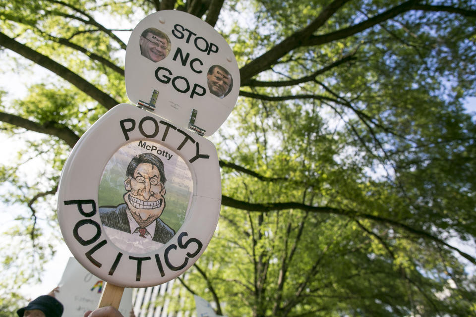 Protesters in May 2016 gather across the street from the North Carolina state legislative building in Raleigh to voice their concerns over House Bill 2. (Photo: Al Drago/CQ Roll Call)