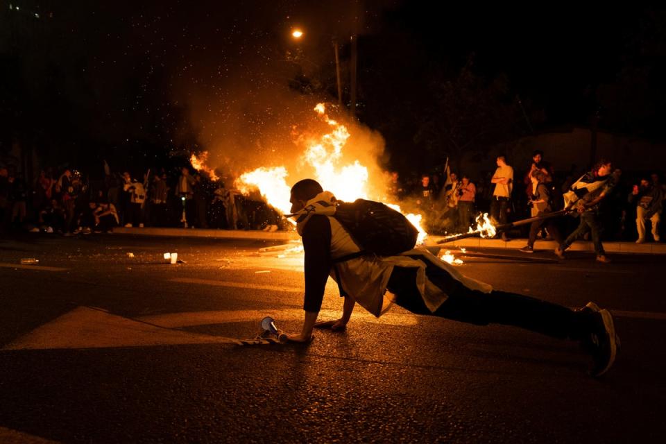 Demonstrators block streets as they protest the judicial overhaul plans (AP)