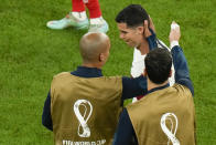Portugal's Cristiano Ronaldo, right, reacts as he leaves the pitch after the World Cup quarterfinal soccer match against Morocco, at Al Thumama Stadium in Doha, Qatar, Saturday, Dec. 10, 2022. (AP Photo/Alessandra Tarantino)