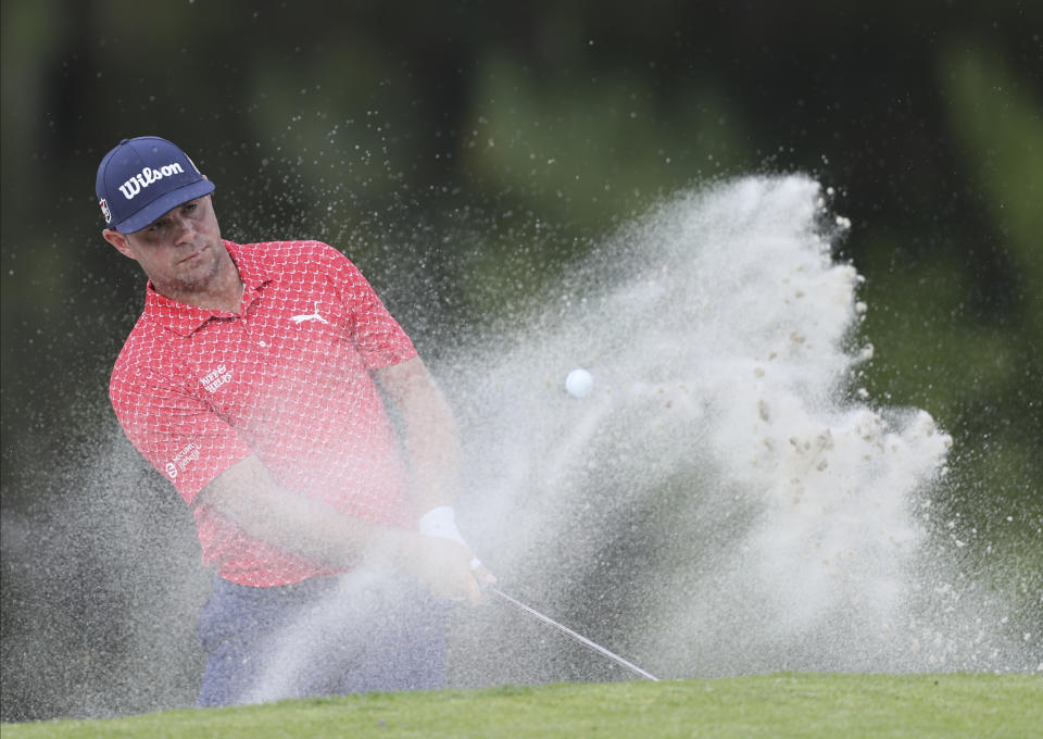 Gary Woodland of United States hits from the bunker at the 17th hole during the final round for the WGC-Mexico Championship golf tournament, at the Chapultepec Golf Club in Mexico City, Sunday, Feb. 23, 2020.(AP Photo/Fernando Llano)