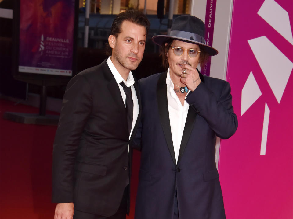 Johnny Depp and City Of Lies director Brad Furman at a screening in France in September 2021. 