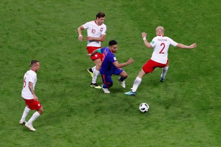 Soccer Football - World Cup - Group H - Poland vs Colombia - Kazan Arena, Kazan, Russia - June 24, 2018 Colombia's Radamel Falcao in action with Poland's Grzegorz Krychowiak and Michal Pazdan REUTERS/Jorge Silva