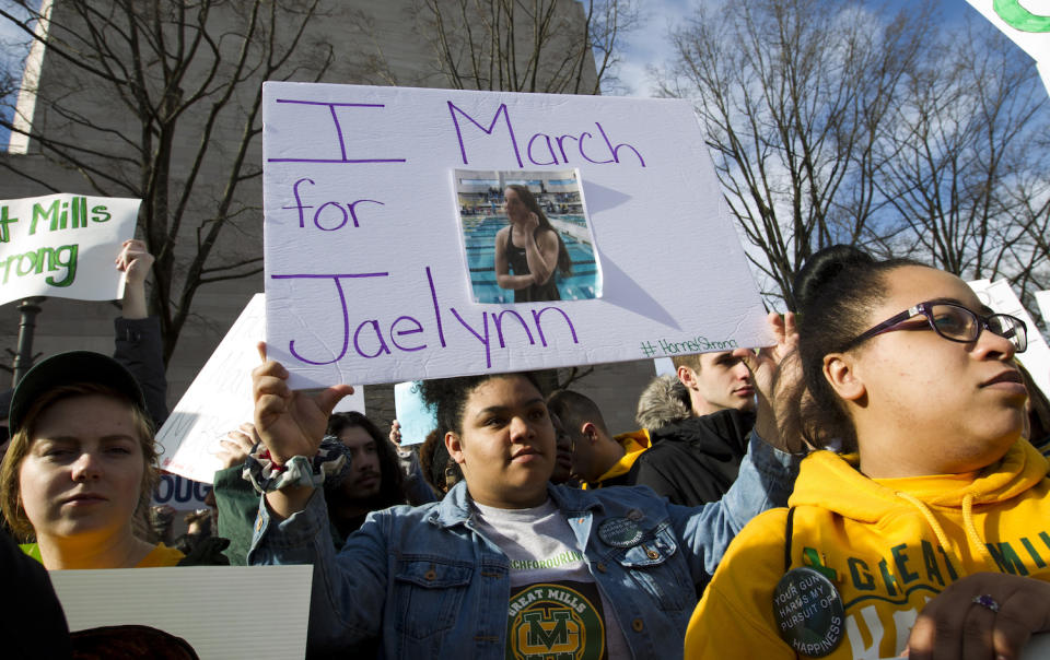 <p>A student from Great Mills High School in Maryland holds up the photograph of her classmate Jaelynn Willey at the March for Our Lives rally. Willey was killed in another school shooting. (AP Photo/Jose Luis Magana) </p>