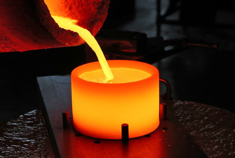 Liquid gold is poured to form grains at Swiss refinery Metalor in Marin