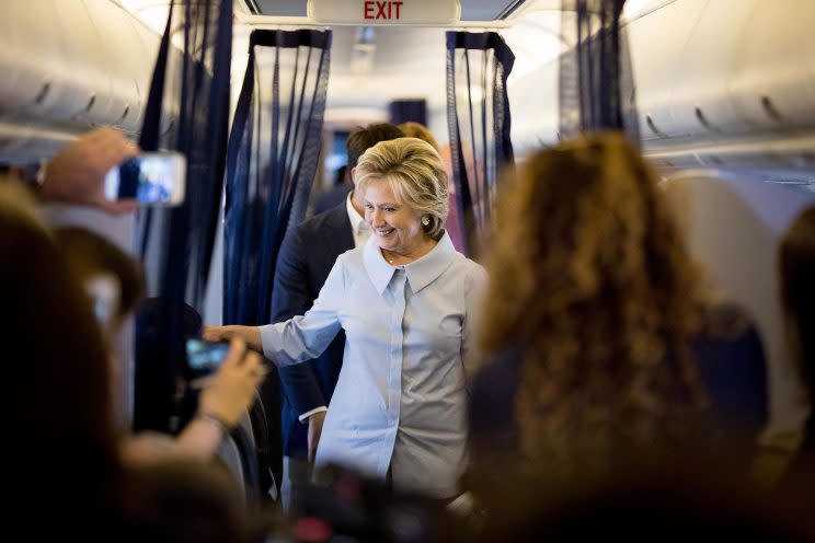 Democratic presidential candidate Hillary Clinton speaks to members of the media on her first flight on a new campaign plane before taking off from Westchester County Airport in White Plains, N.Y. (Photo: Andrew Harnik/AP)