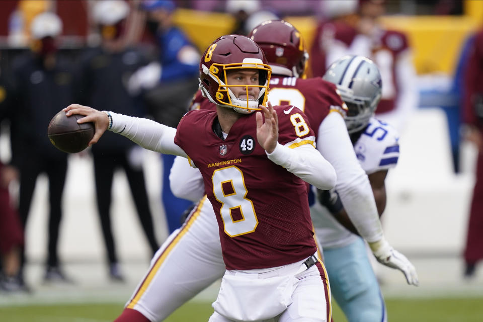 Washington Football Team quarterback Kyle Allen (8) passing the ball in the first half of an NFL football game against Dallas Cowboys, Sunday, Oct. 25, 2020, in Landover, Md. (AP Photo/Patrick Semansky)