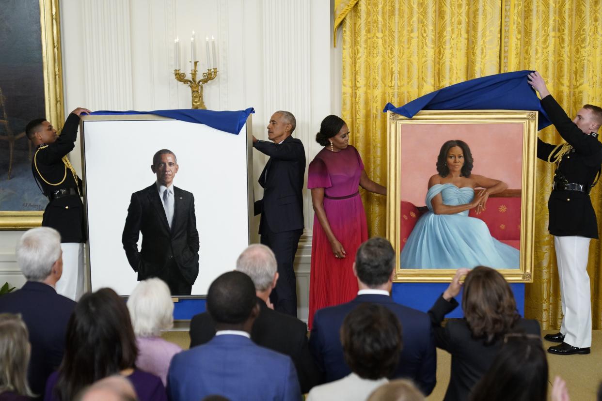 Former President Barack Obama and former first lady Michelle Obama unveil their official White House portraits during a ceremony in the East Room of the White House, Wednesday, Sept. 7, 2022, in Washington. 