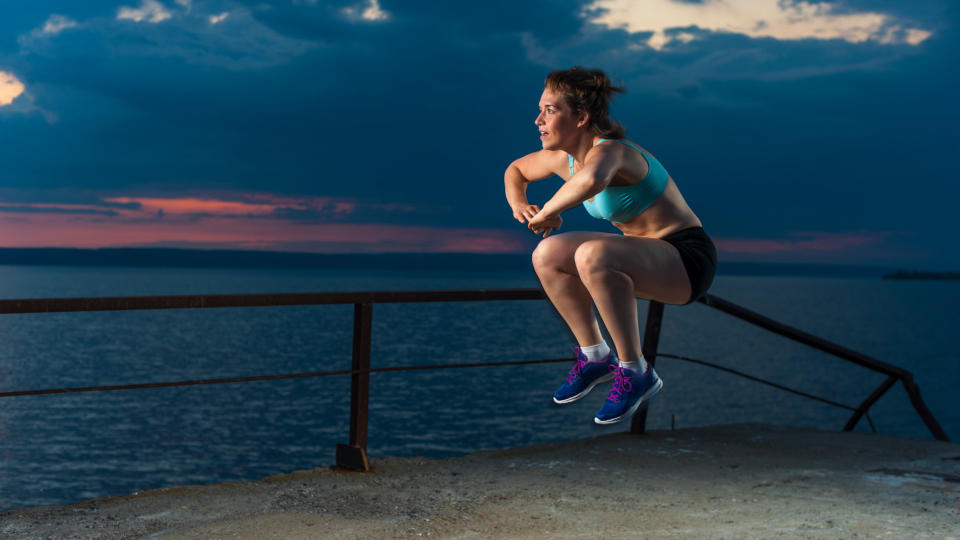 Woman doing counter movement jump