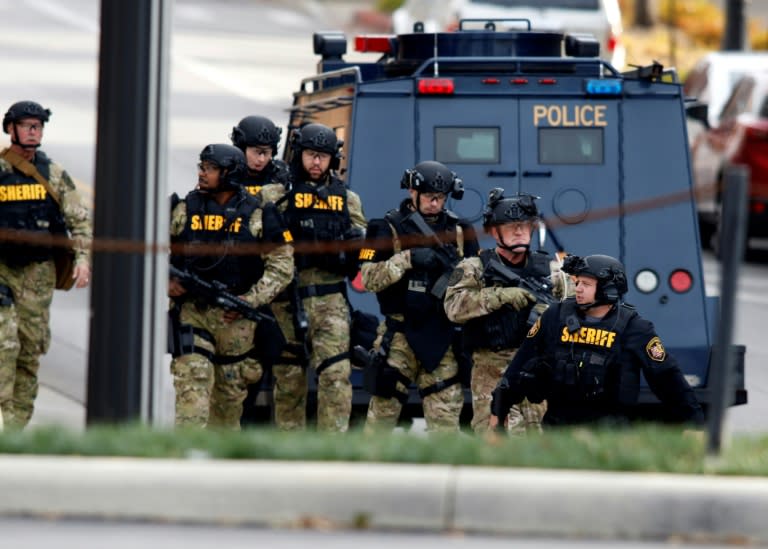 Law enforcement officials are seen outside of a parking garage on the campus of Ohio State University as they respond to an attack in Columbus, Ohio, on November 28, 2016