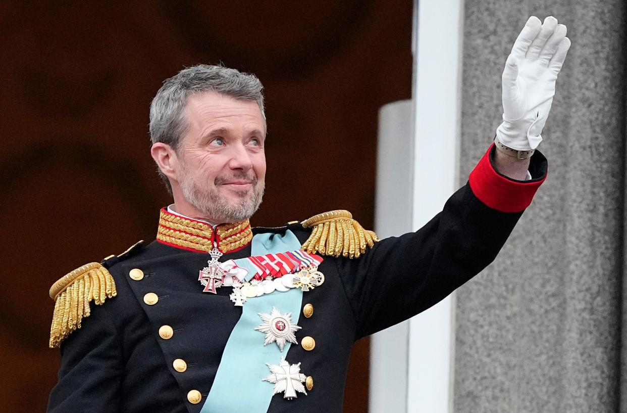 Denmark's King Frederik X waves from the balcony of Christiansborg Palace in Copenhagen, Denmark, on Jan. 14, 2024. Queen Margrethe II is  Denmark's first monarch to abdicate in nearly 900 years.