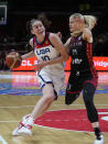 United States' Breanna Stewart, drives past Belgium's Becky Massey during their women's Basketball World Cup game in Sydney, Australia, Thursday, Sept. 22, 2022. (AP Photo/Mark Baker)