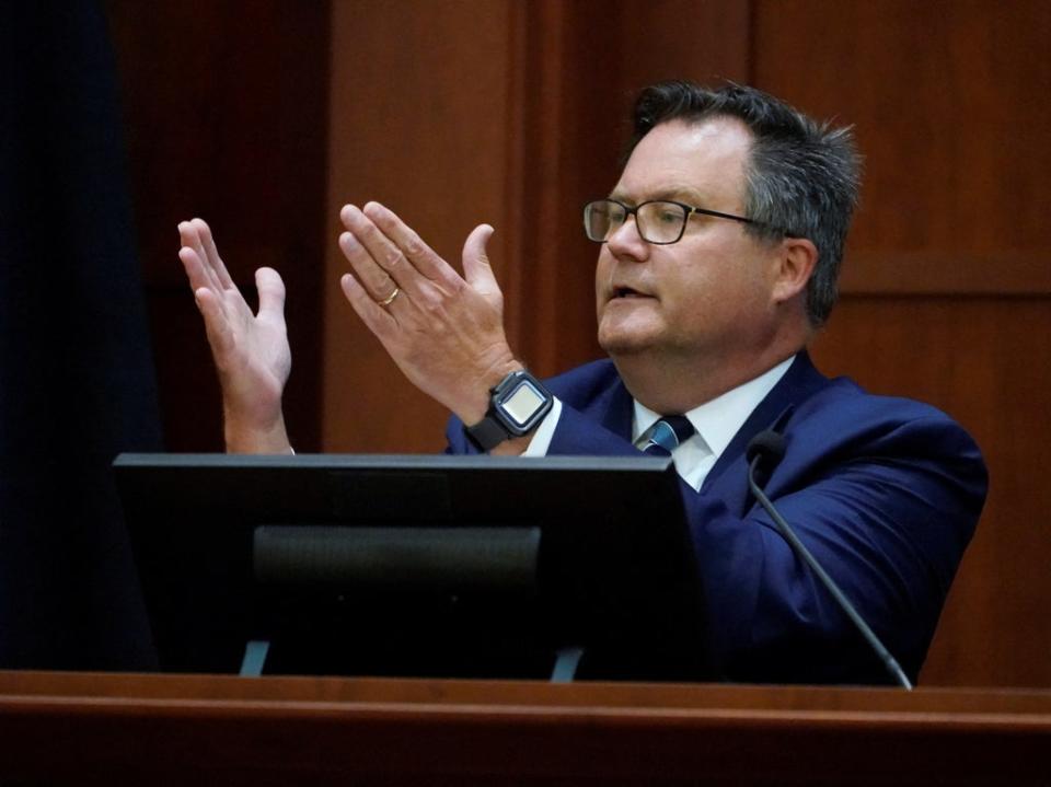 Dr. Richard Moore, Jr., testifies in the courtroom during actor Johnny Depp's defamation case against ex-wife, actor Amber Heard, at the Fairfax County Circuit Courthouse in Fairfax, U.S., May 23, 2022 (REUTERS)