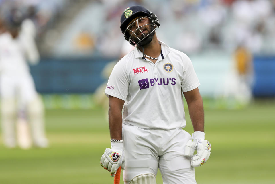 India's Rishabh Pant reacts as he leaves the field after he was dismissed during play on day two of the second cricket test between India and Australia at the Melbourne Cricket Ground, Melbourne, Australia, Sunday, Dec. 27, 2020. (AP Photo/Asanka Brendon Ratnayake)