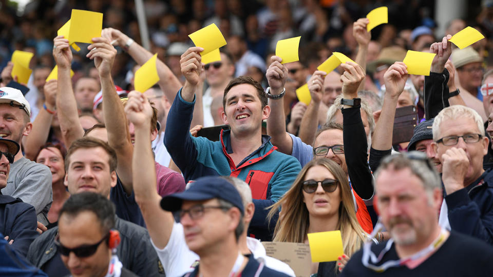 England fans brandished sandpaper at the Aussie players. (Photo by Stu Forster/Getty Images)