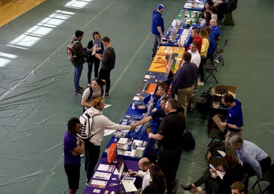 Students attend a teach-out and transfer fair at Iowa Wesleyan University on Monday.