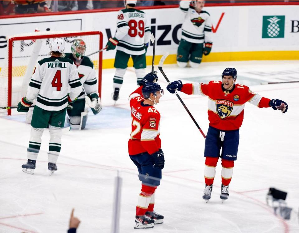 Florida Panthers defenseman Gustav Forsling (42) celebrate after scoring on an assist by Florida Panthers left wing Grigori Denisenko (14) against Minnesota Wild in the third period at FLA Live Arena in Sunrise, FL on Saturday, January 21, 2023. 