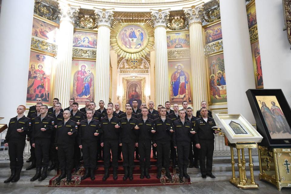New Russian conscripts attend a religious service at the Trinity Cathedral before their departure for garrisons in Saint Petersburg on May 23, 2023. (Olga Maltseva/AFP via Getty Images)