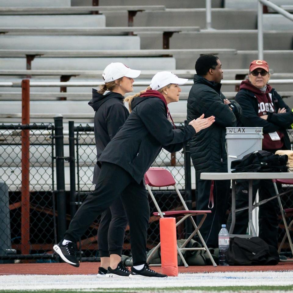 Colgate Women's Lacrosse Head Coach Kathy Taylor gives instructions to her players on the sideline during a home game at Colgate University.