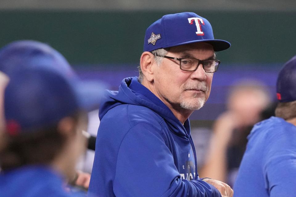 Texas Rangers manager Bruce Bochy watches batting practice before Game 3 of the baseball team's AL Division Series against the Baltimore Orioles in Arlington, Texas, Tuesday, Oct. 10, 2023. (AP Photo/LM Otero)