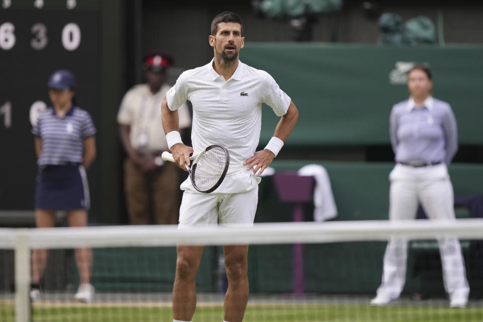 Serbia's Novak Djokovic reacts after losing a point against Spain's Carlos Alcaraz during the men's singles final on day fourteen of the Wimbledon tennis championships in London, Sunday, July 16, 2023. (AP Photo/Alberto Pezzali)