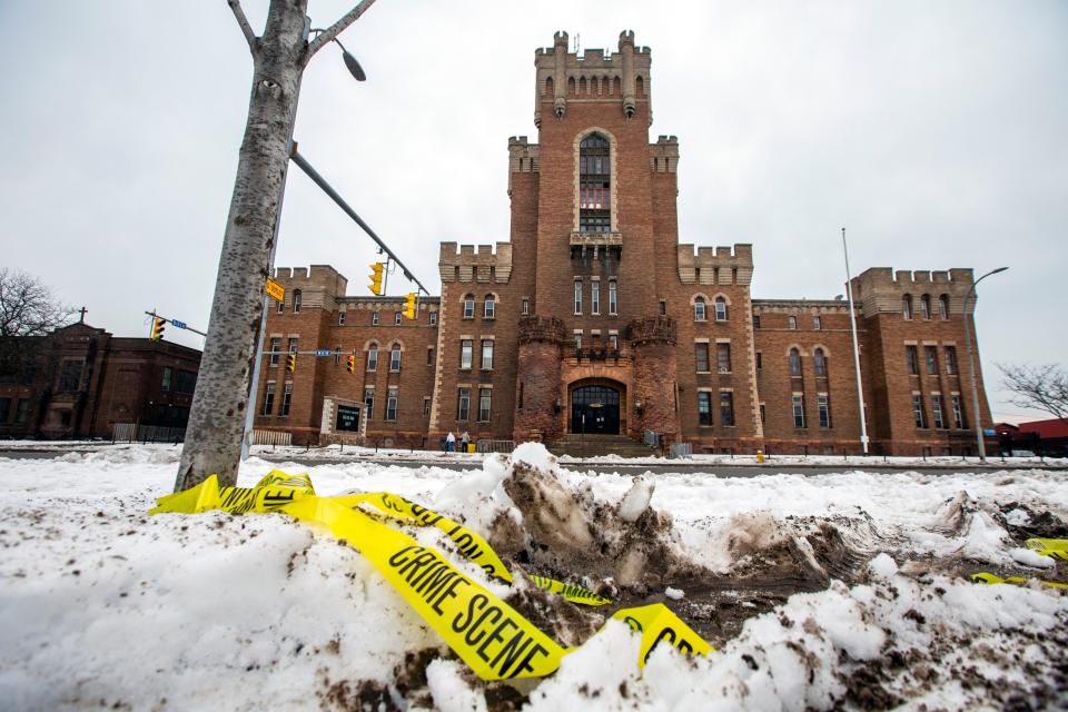 Police tape remains on the ground outside of the Main Street Armory on Monday, March 6, 2023, in Rochester.