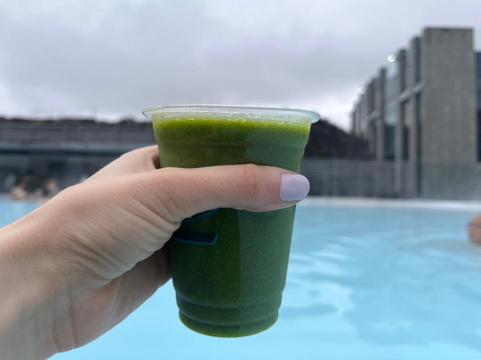 Holding a smoothie at the Blue Lagoon