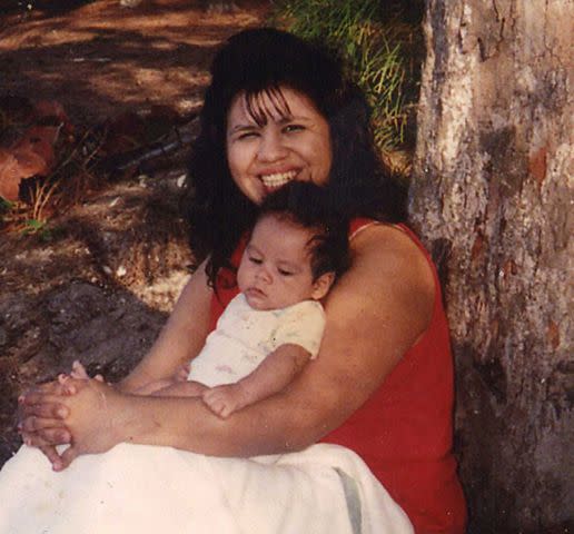 <p>Courtesy Innocence Project </p> Melissa Elizabeth Lucio, with one of her children.