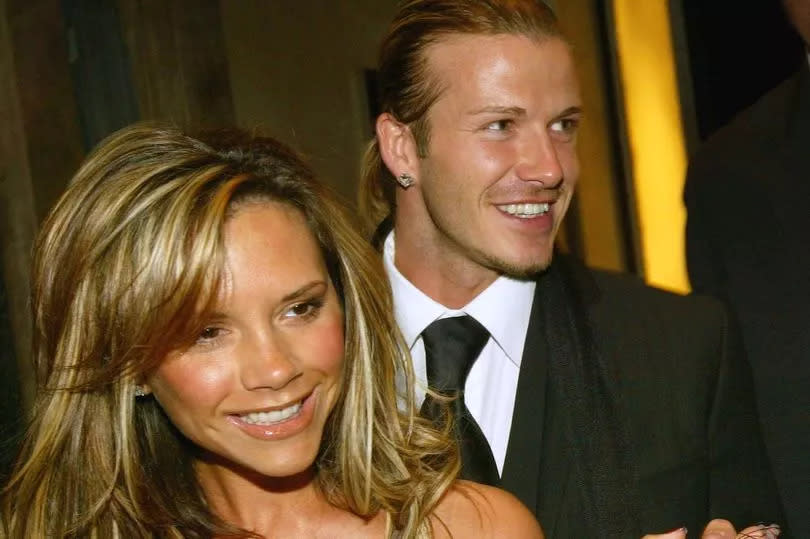 Real Madrid footballer David Beckham and his wife, Victoria Beckham, leave Claridges Hotel on April 12, 2004 in London.