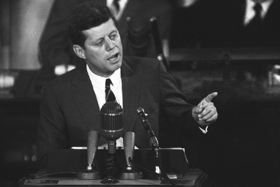 In this May 25, 1961 file photo, President John F. Kennedy speaks before a joint session of Congress in Washington, urging congressional approval of additional funds to bolster space, foreign aid and defense programs.