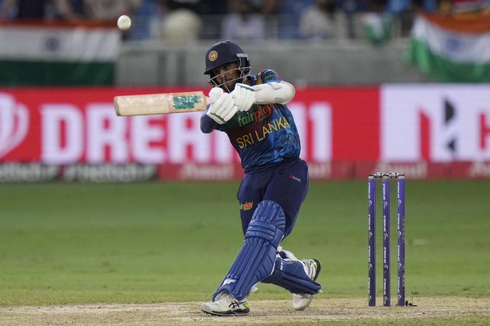 Sri Lanka's Kusal Mendis plays a shot during the T20 cricket match of Asia Cup between Sri Lanka and India, in Dubai, United Arab Emirates, Tuesday, Sept. 6, 2022. (AP Photo/Anjum Naveed)